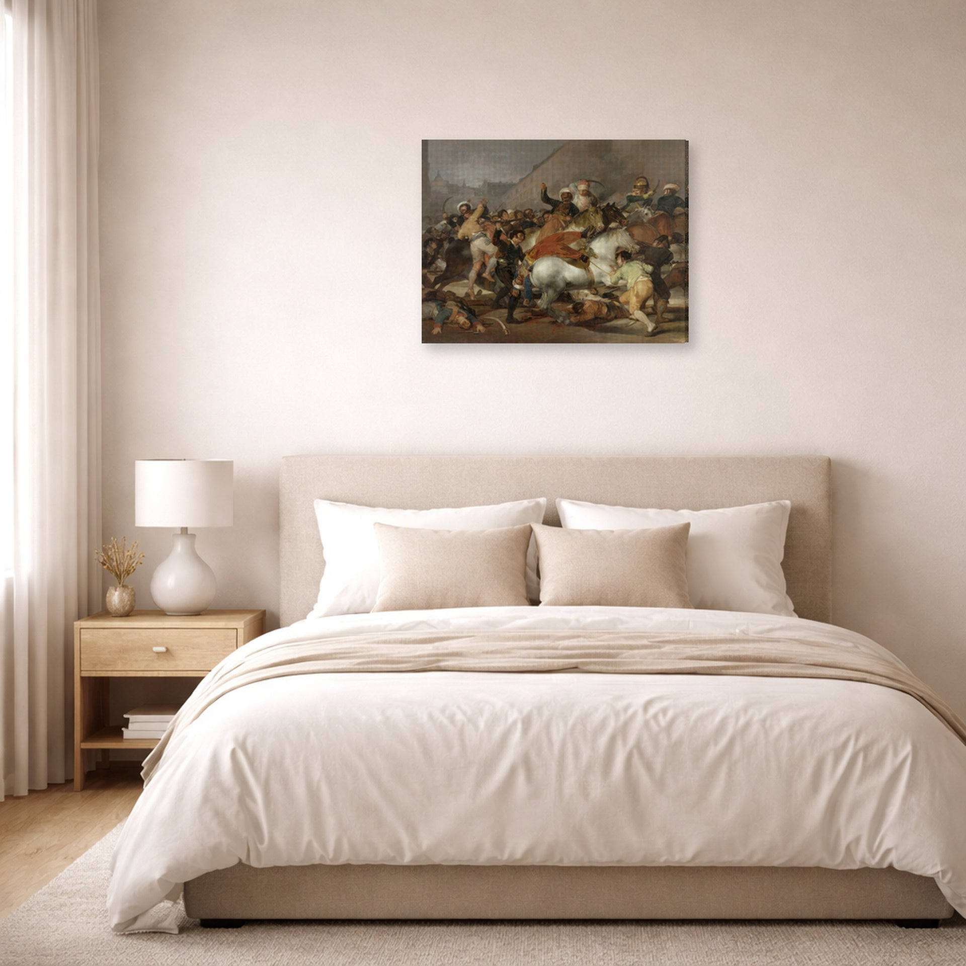 Gallery-wrapped canvas print of Francisco Goya's The Second of May displayed on a wall in a bedroom