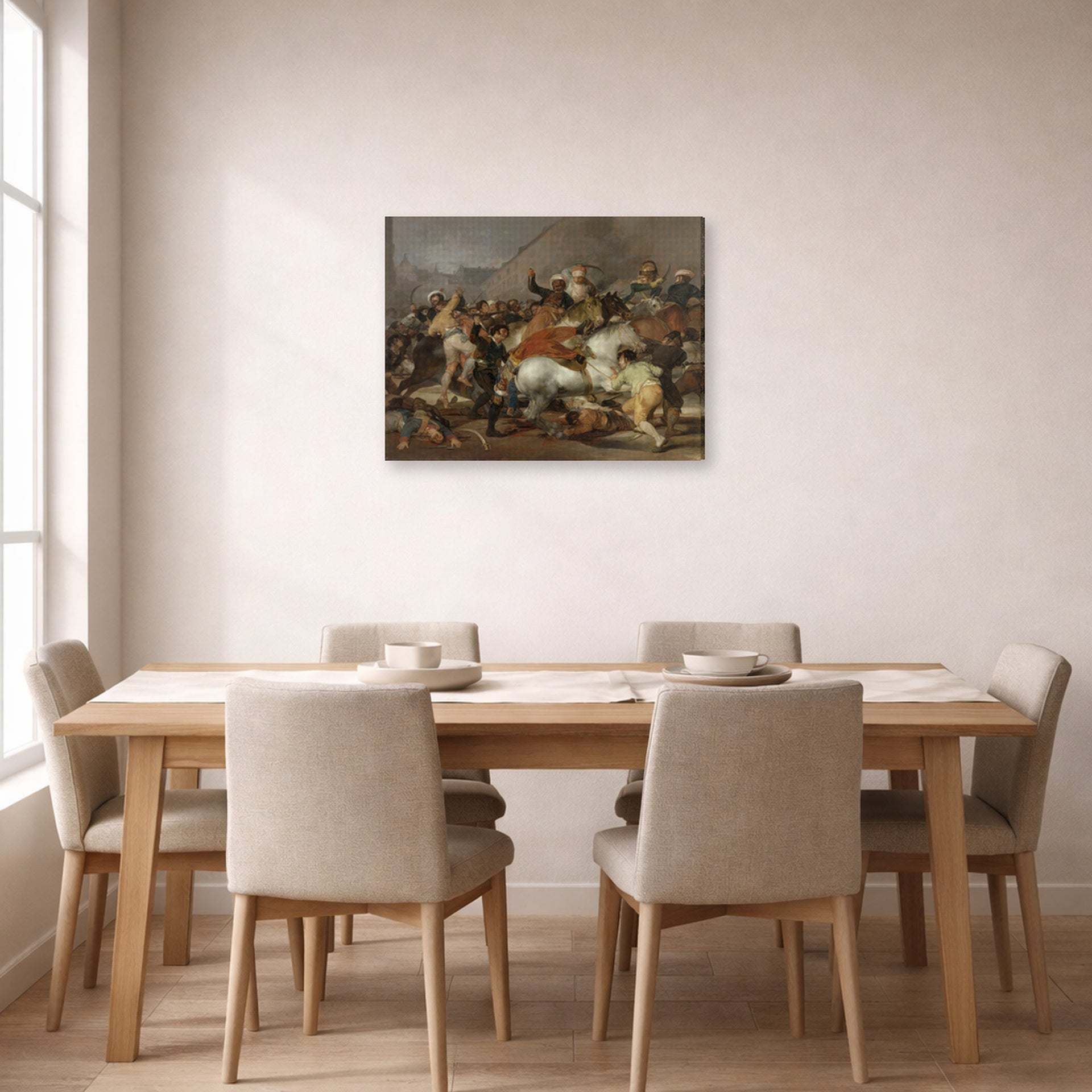 Gallery-wrapped canvas print of Francisco Goya's The Second of May displayed on a wall in a dining room