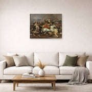 Unframed poster print of Francisco Goya's The Second of May displayed on a wall in a second living room setting