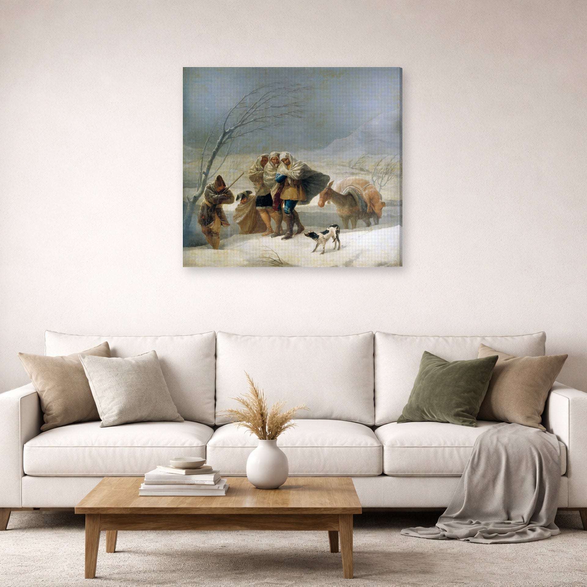 Gallery-wrapped canvas print of Francisco Goya's The Snowstorm (Winter) displayed on a wall in a second living room setting