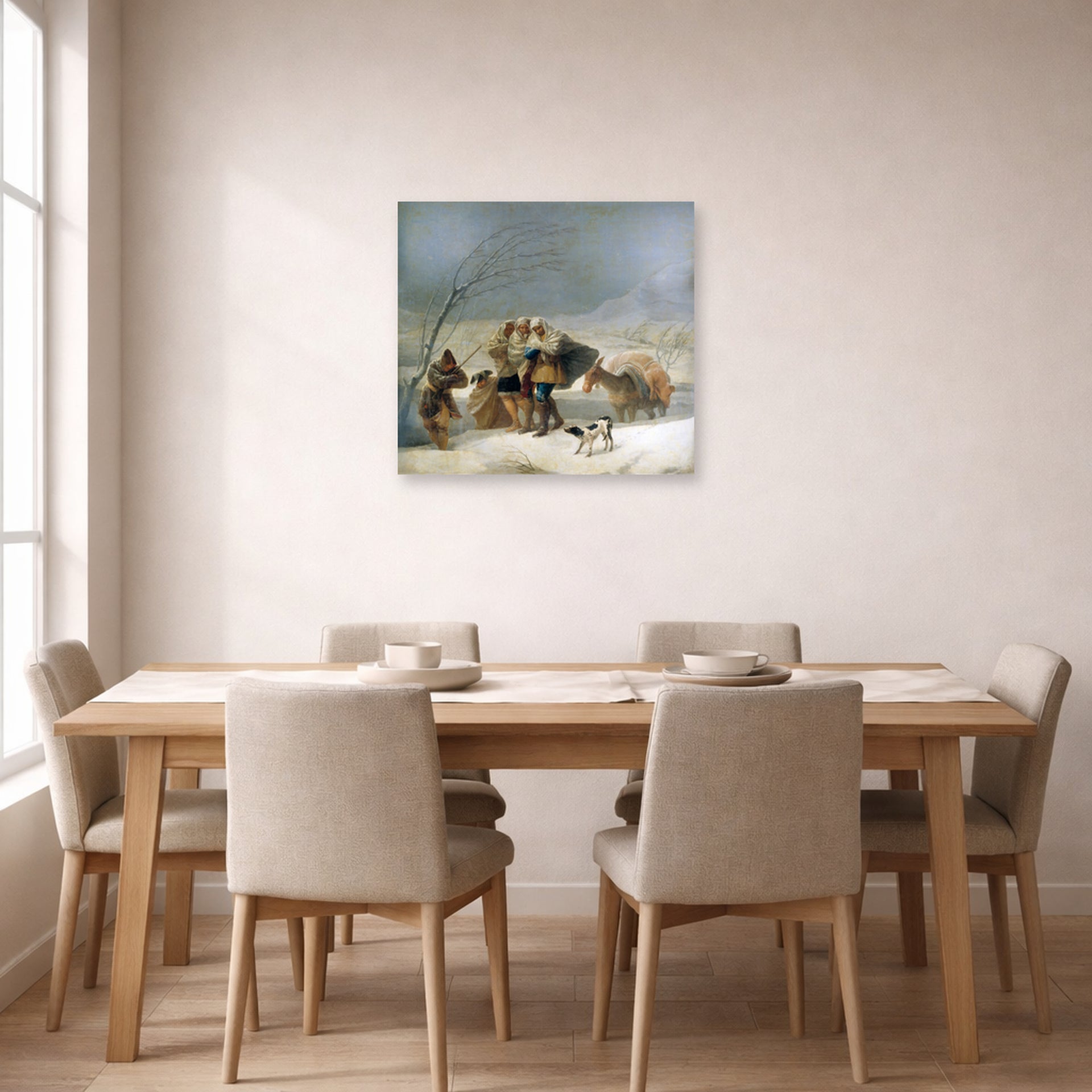 Unframed poster print of Francisco Goya's The Snowstorm (Winter) displayed on a wall in a dining room