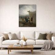 Gallery-wrapped canvas print of Francisco Goya's The Strolling Players displayed on a wall in a second living room setting