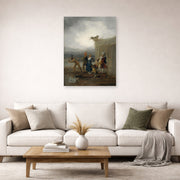 Unframed poster print of Francisco Goya's The Strolling Players displayed on a wall in a second living room setting