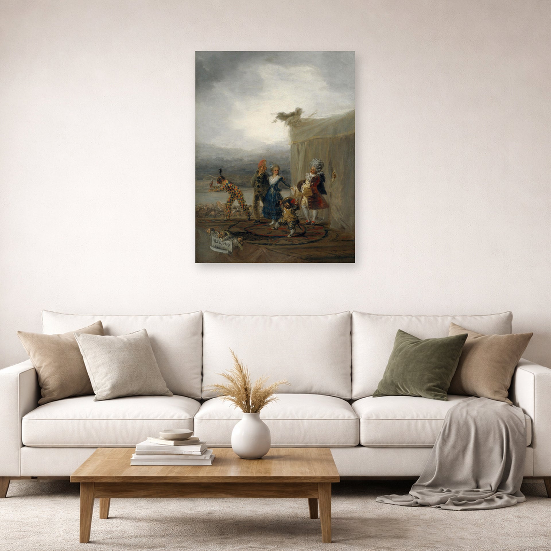 Unframed poster print of Francisco Goya's The Strolling Players displayed on a wall in a second living room setting