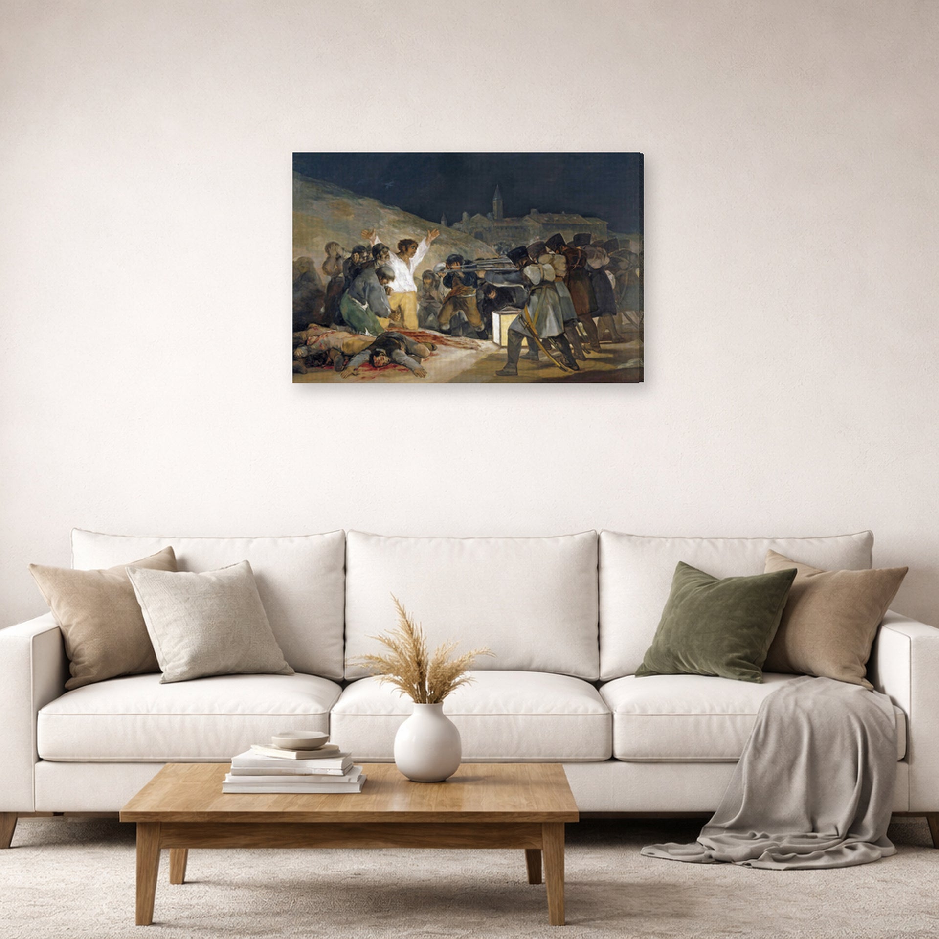 Gallery-wrapped canvas print of Francisco Goya's The Third of May 1808, El tres de mayo de 1808 en Madrid displayed on a wall in a second living room setting