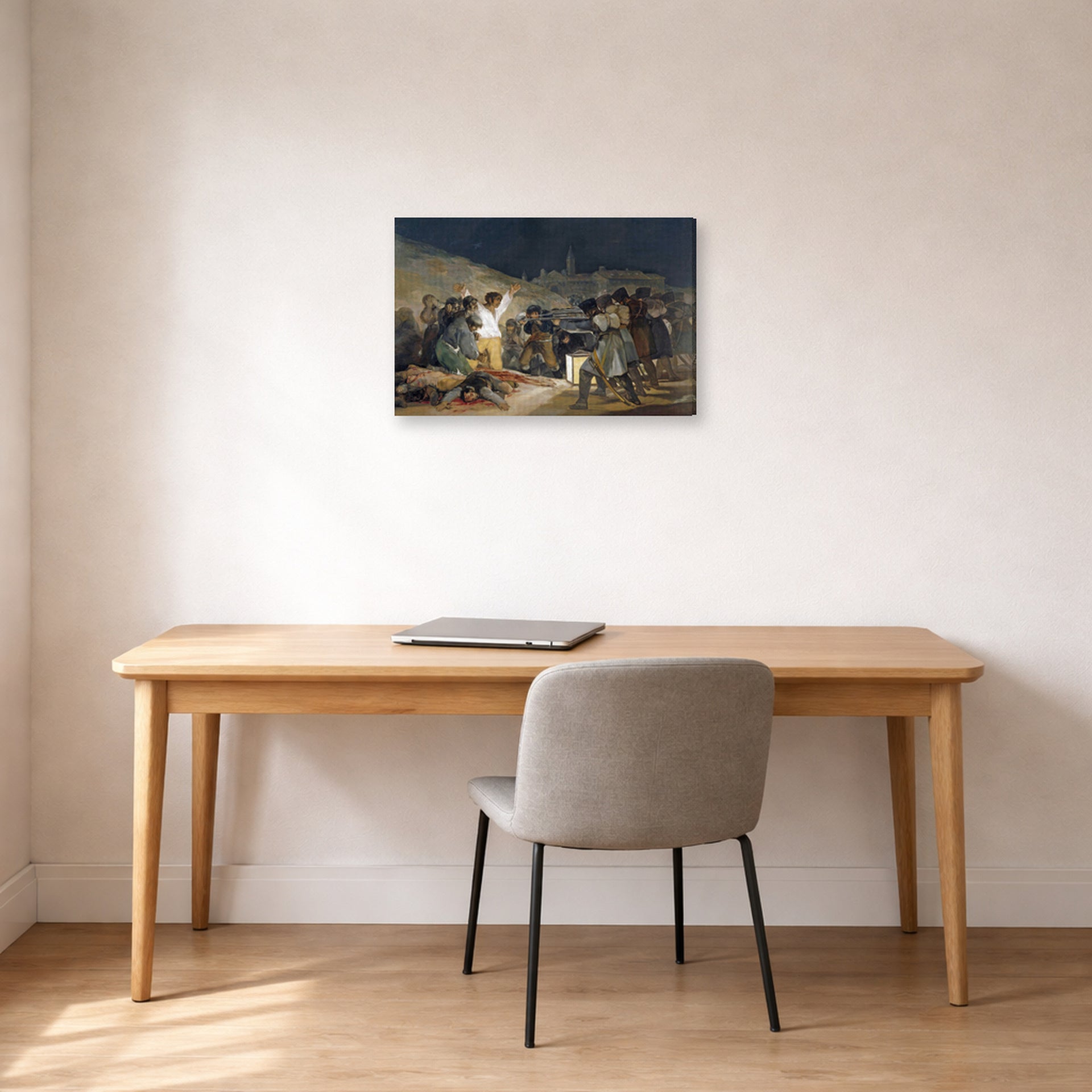 Gallery-wrapped canvas print of Francisco Goya's The Third of May 1808, El tres de mayo de 1808 en Madrid displayed on a wall in a office
