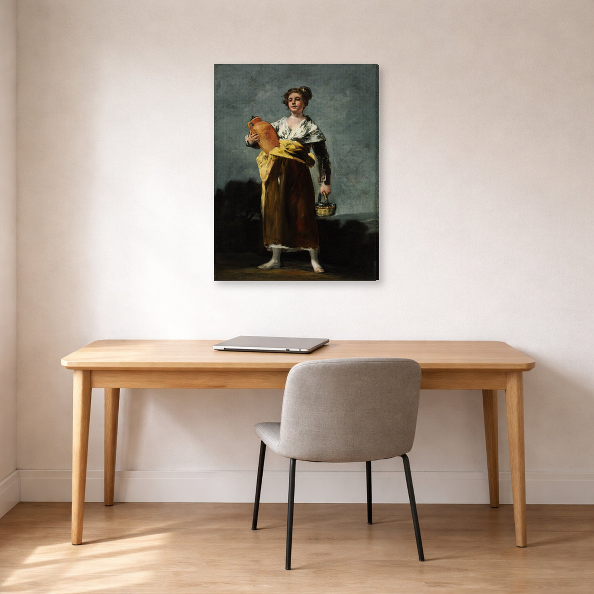 Gallery-wrapped canvas print of Francisco Goya's The Water Carrie displayed on a wall in a office