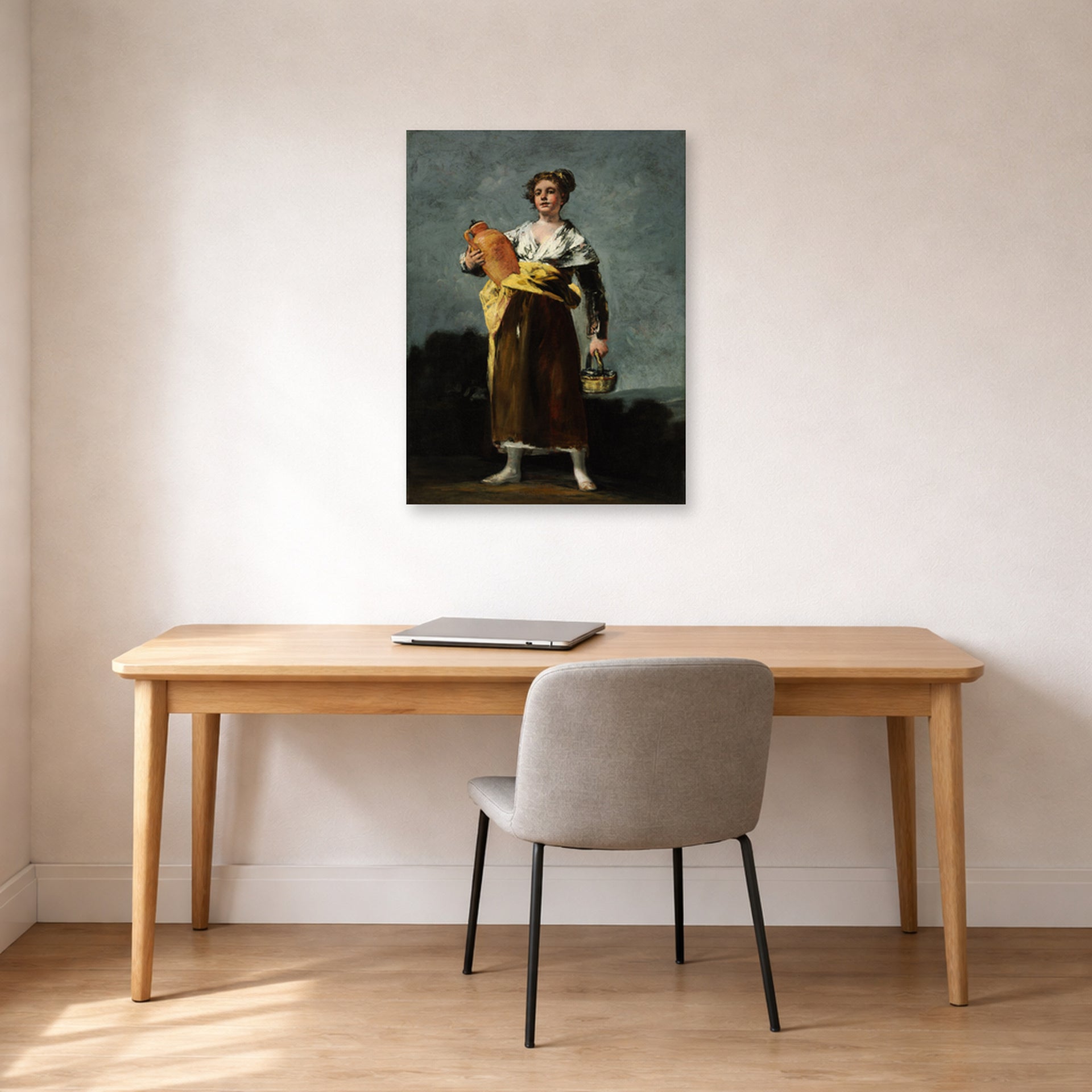 Unframed poster print of Francisco Goya's The Water Carrie displayed on a wall in a office