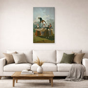 Gallery-wrapped canvas print of Francisco Goya's The Wimp displayed on a wall in a second living room setting