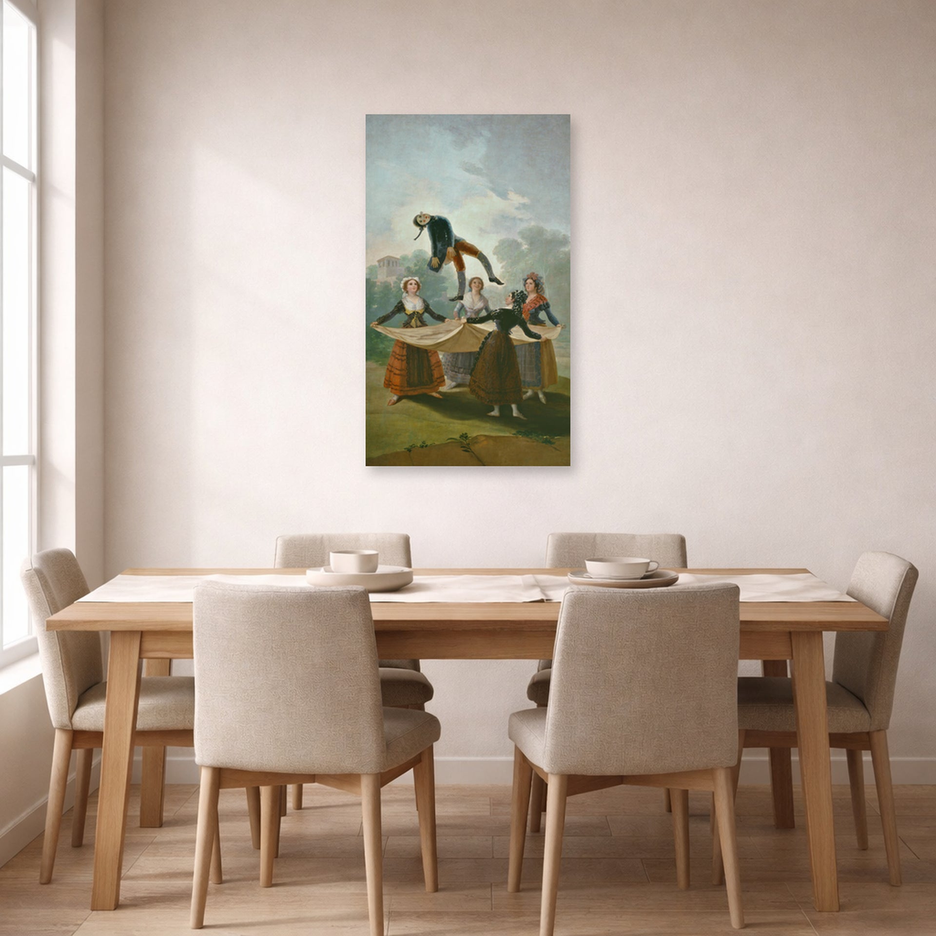 Unframed poster print of Francisco Goya's The Wimp displayed on a wall in a dining room
