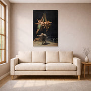 Gallery-wrapped canvas print of Francisco Goya's Witches Flight displayed on a wall in a living room