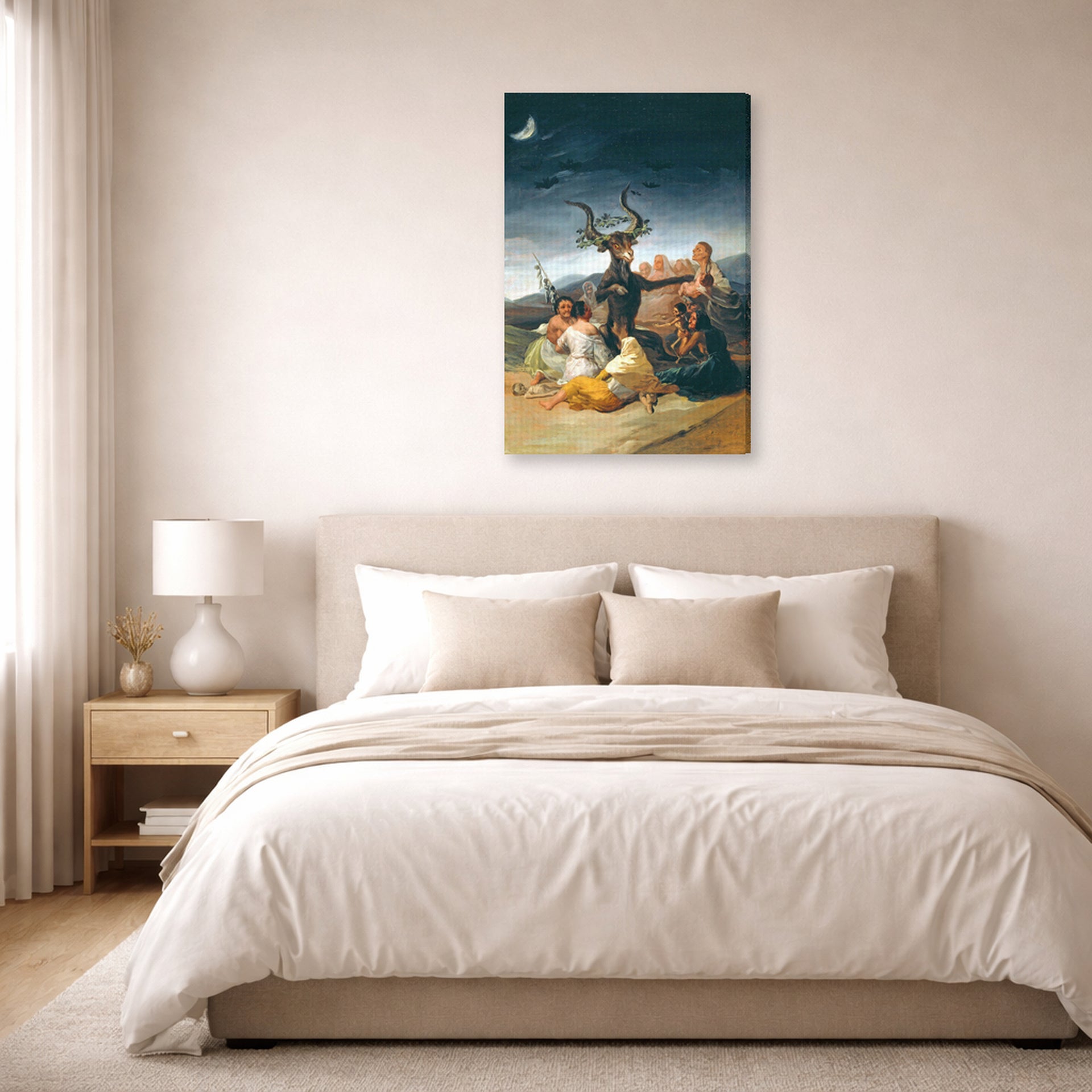 Gallery-wrapped canvas print of Francisco Goya's Witches Sabbath displayed on a wall in a bedroom