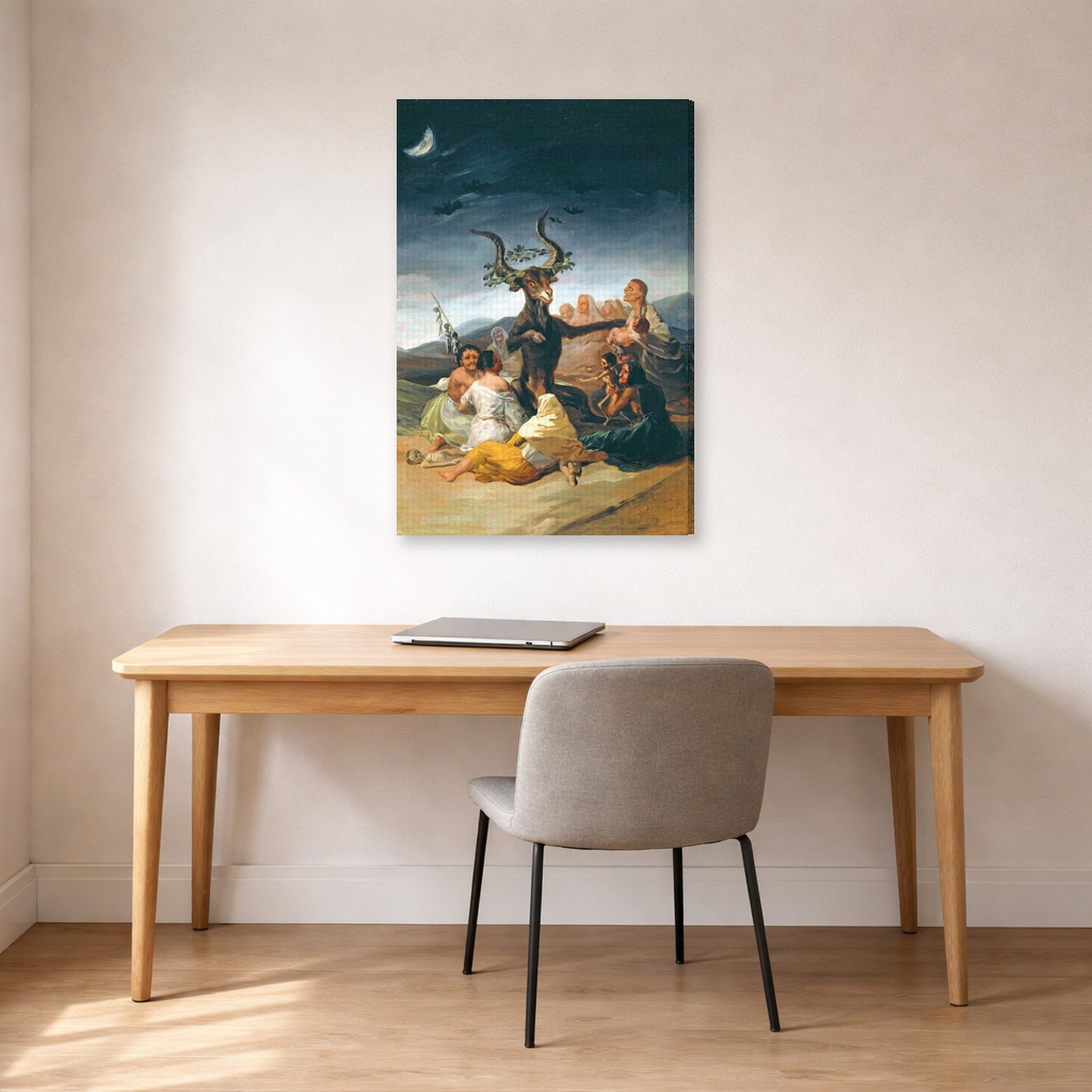 Gallery-wrapped canvas print of Francisco Goya's Witches Sabbath displayed on a wall in a office