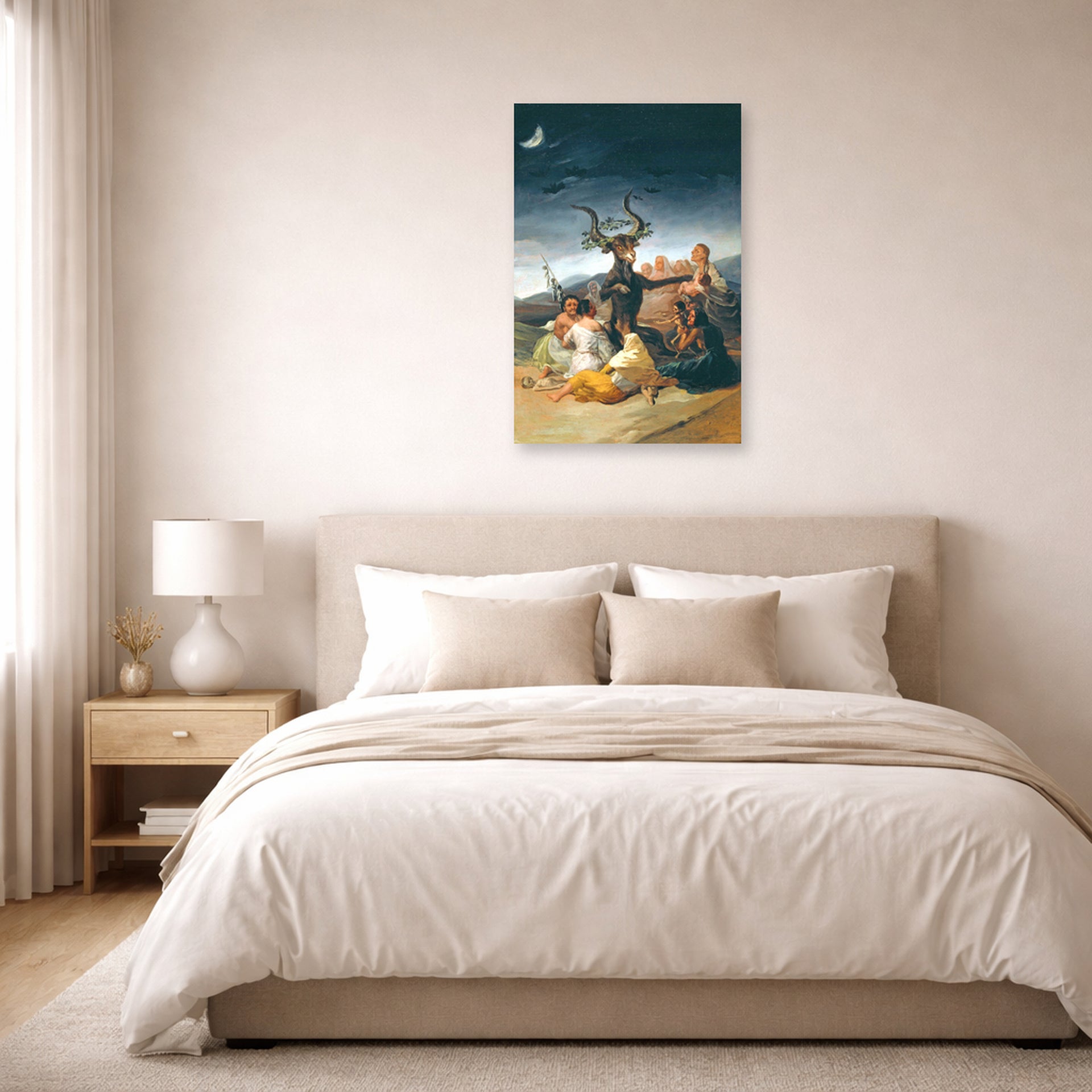 Unframed poster print of Francisco Goya's Witches Sabbath displayed on a wall in a bedroom