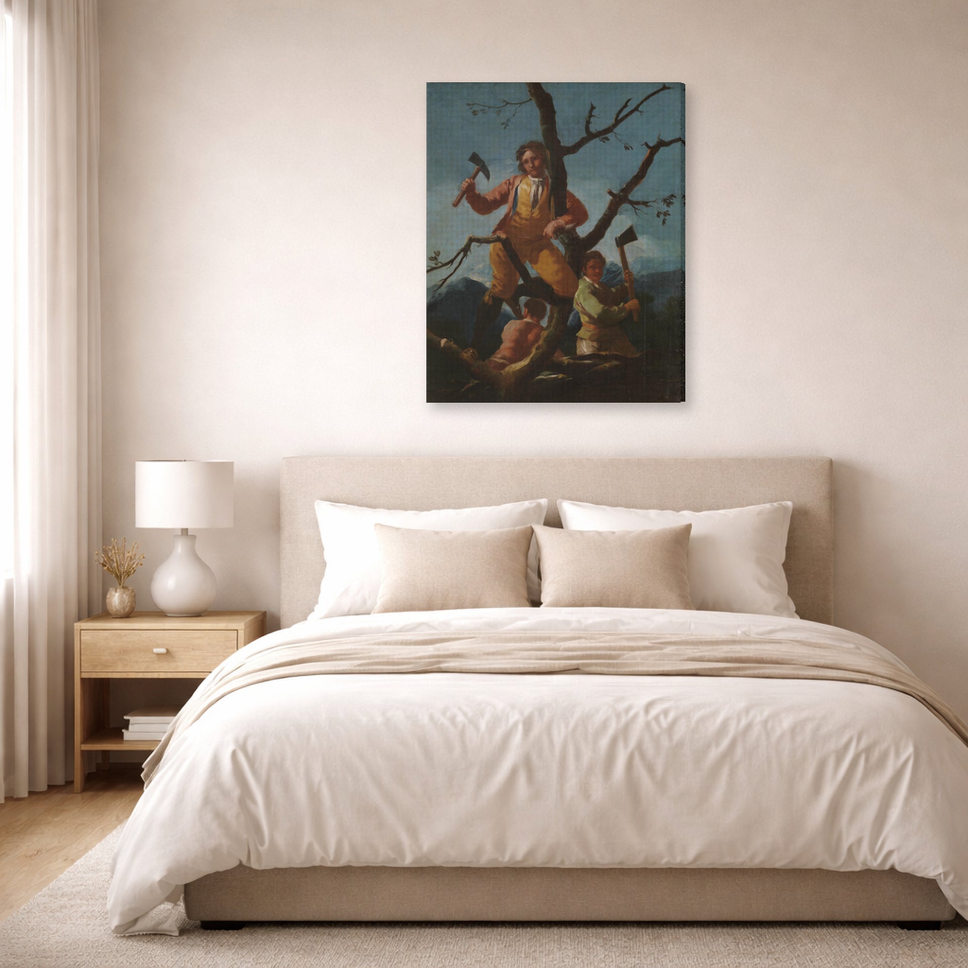 Gallery-wrapped canvas print of Francisco Goya's Woodcutters displayed on a wall in a bedroom