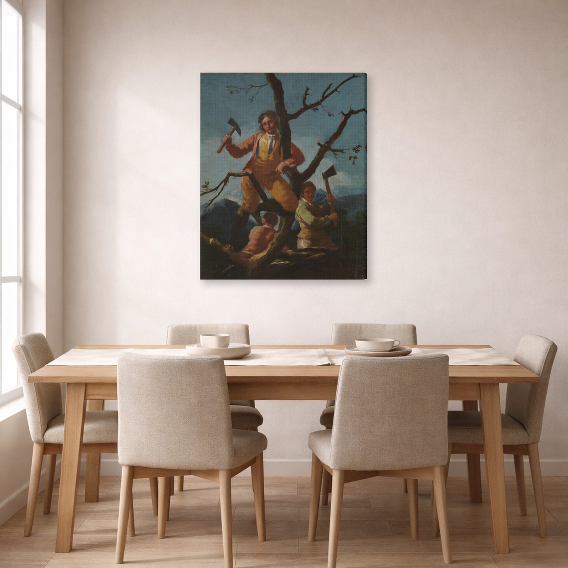 Gallery-wrapped canvas print of Francisco Goya's Woodcutters displayed on a wall in a dining room