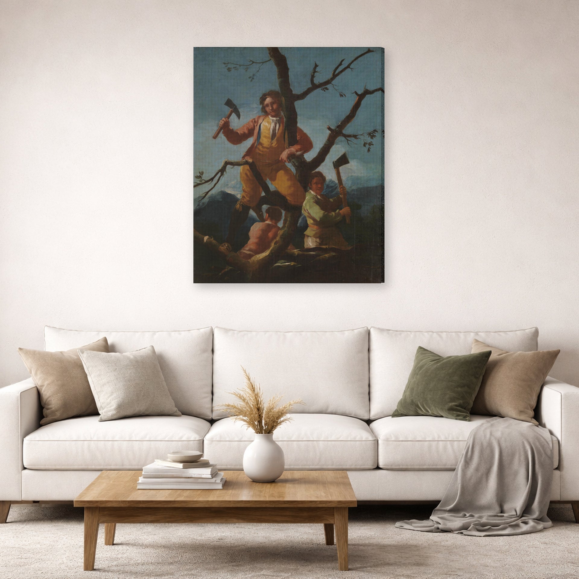 Gallery-wrapped canvas print of Francisco Goya's Woodcutters displayed on a wall in a second living room setting