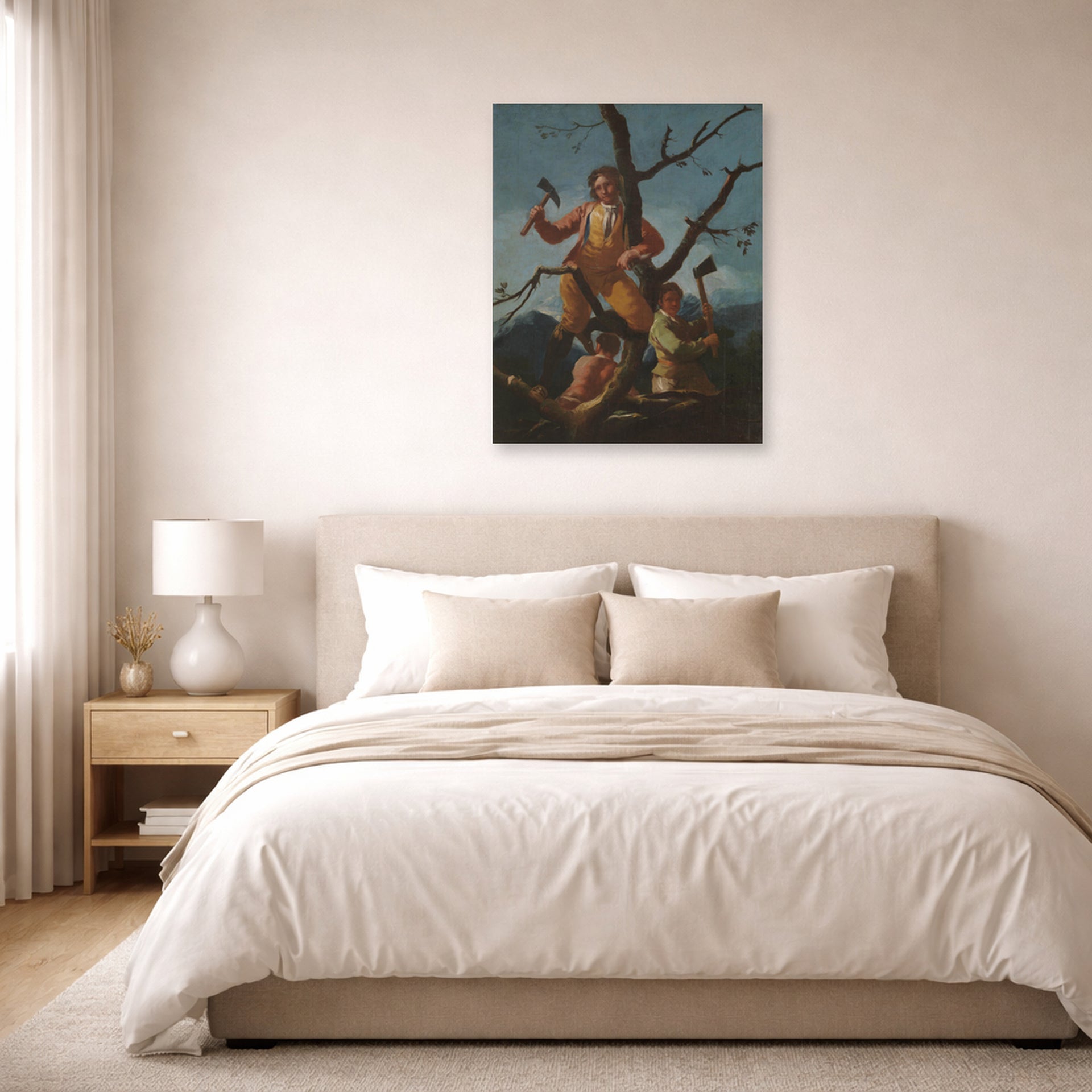 Unframed poster print of Francisco Goya's Woodcutters displayed on a wall in a bedroom
