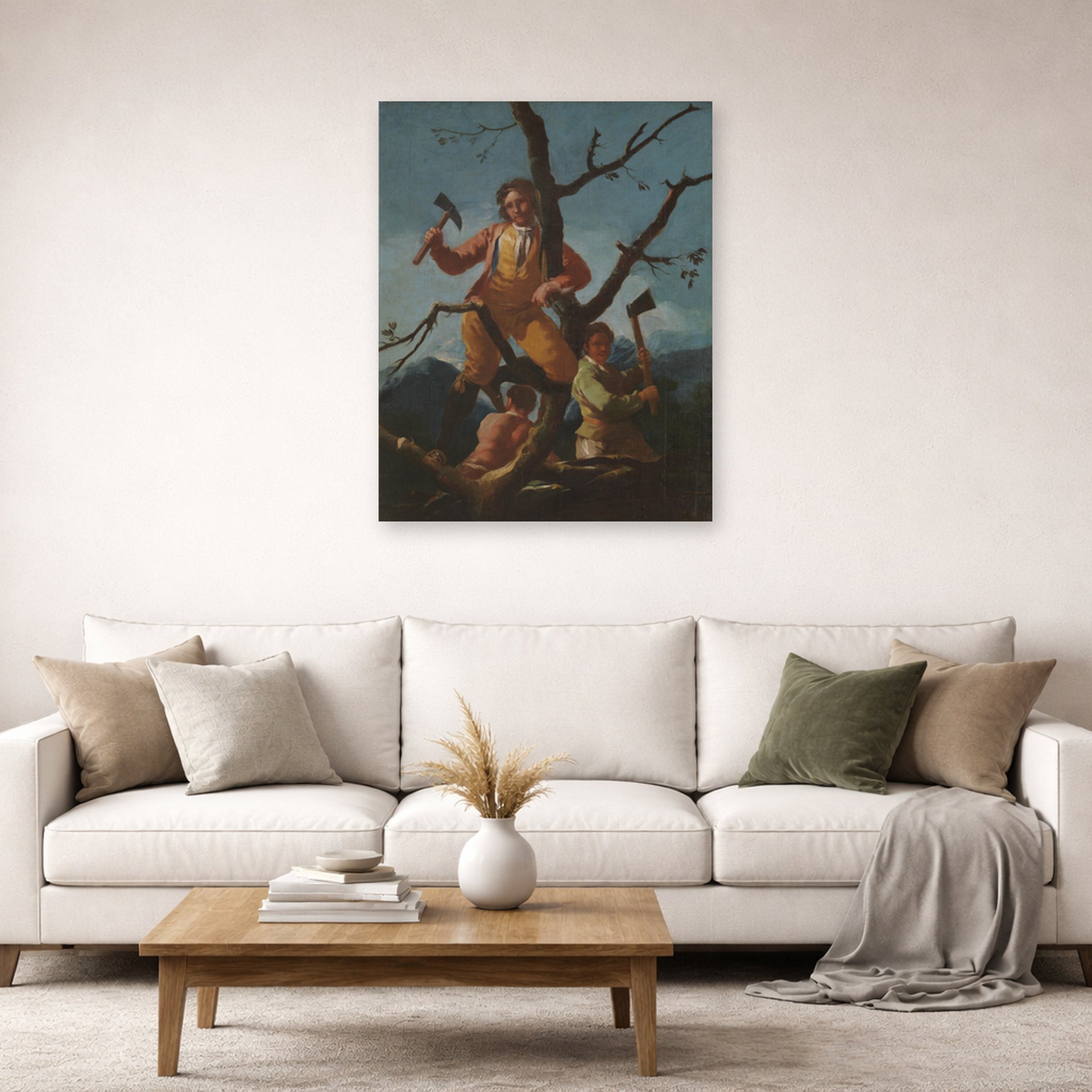 Unframed poster print of Francisco Goya's Woodcutters displayed on a wall in a second living room setting