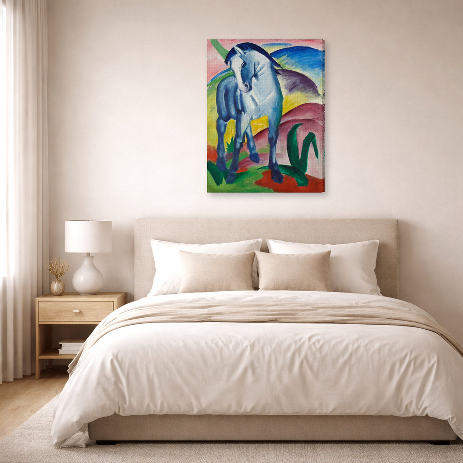 Gallery-wrapped canvas print of Franz Marc's Blue Horse displayed on a wall in a bedroom