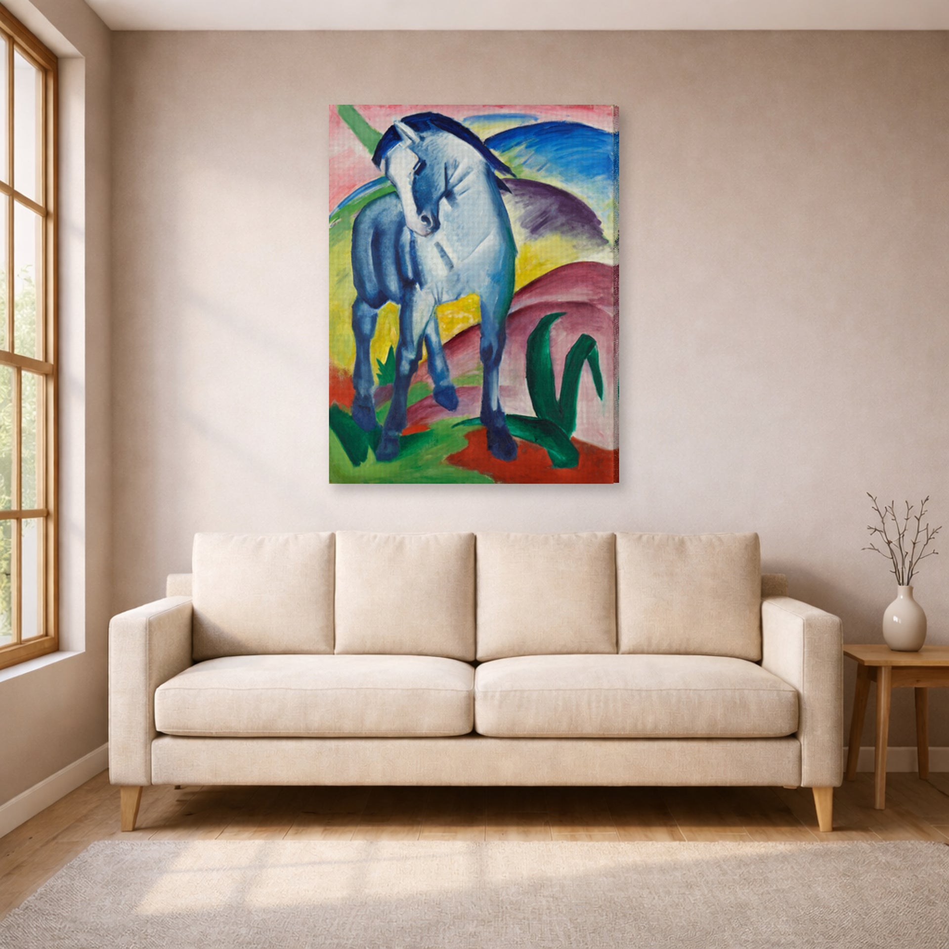 Gallery-wrapped canvas print of Franz Marc's Blue Horse displayed on a wall in a living room