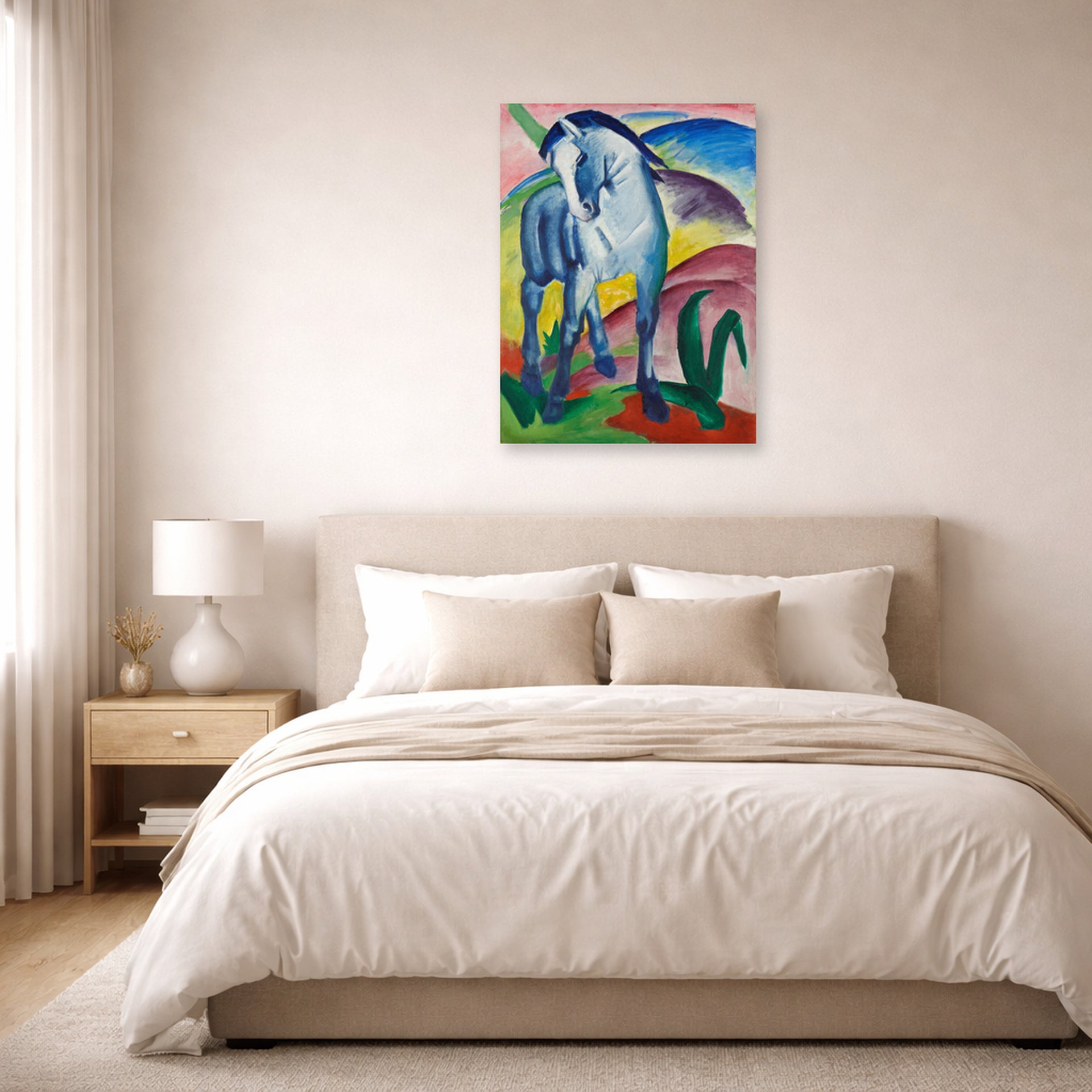 Unframed poster print of Franz Marc's Blue Horse displayed on a wall in a bedroom