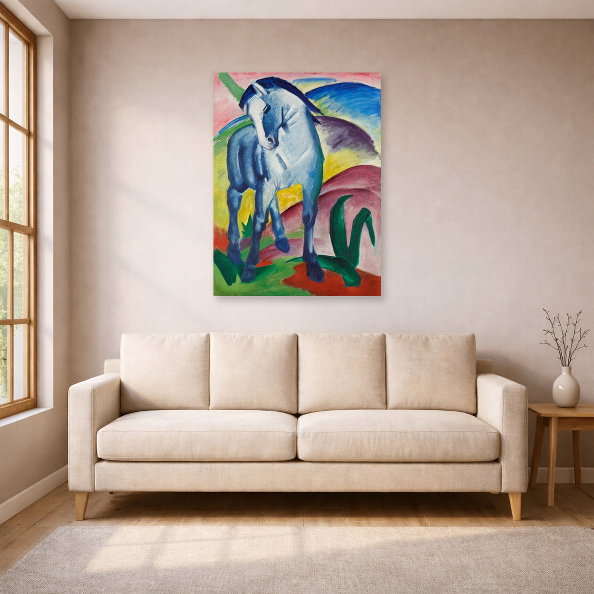 Unframed poster print of Franz Marc's Blue Horse displayed on a wall in a living room