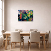 Gallery-wrapped canvas print of Franz Marc's Deer in a Monastery Garden displayed on a wall in a dining room