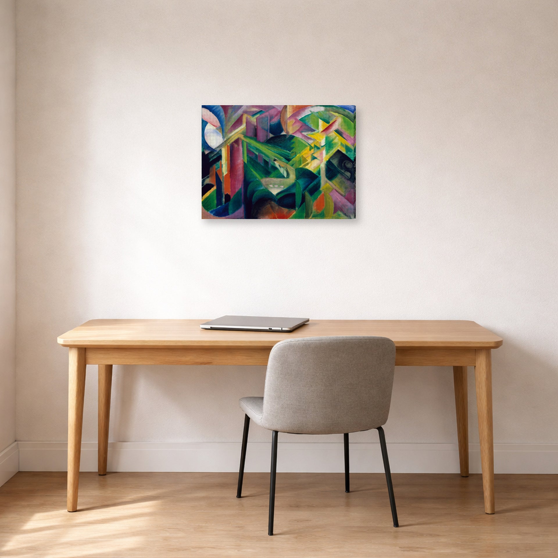 Gallery-wrapped canvas print of Franz Marc's Deer in a Monastery Garden displayed on a wall in an office