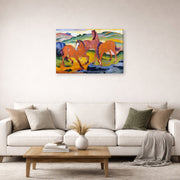 Gallery-wrapped canvas print of Franz Marc's Grazing Horses IV (The Red Horses) displayed on a wall in a living room