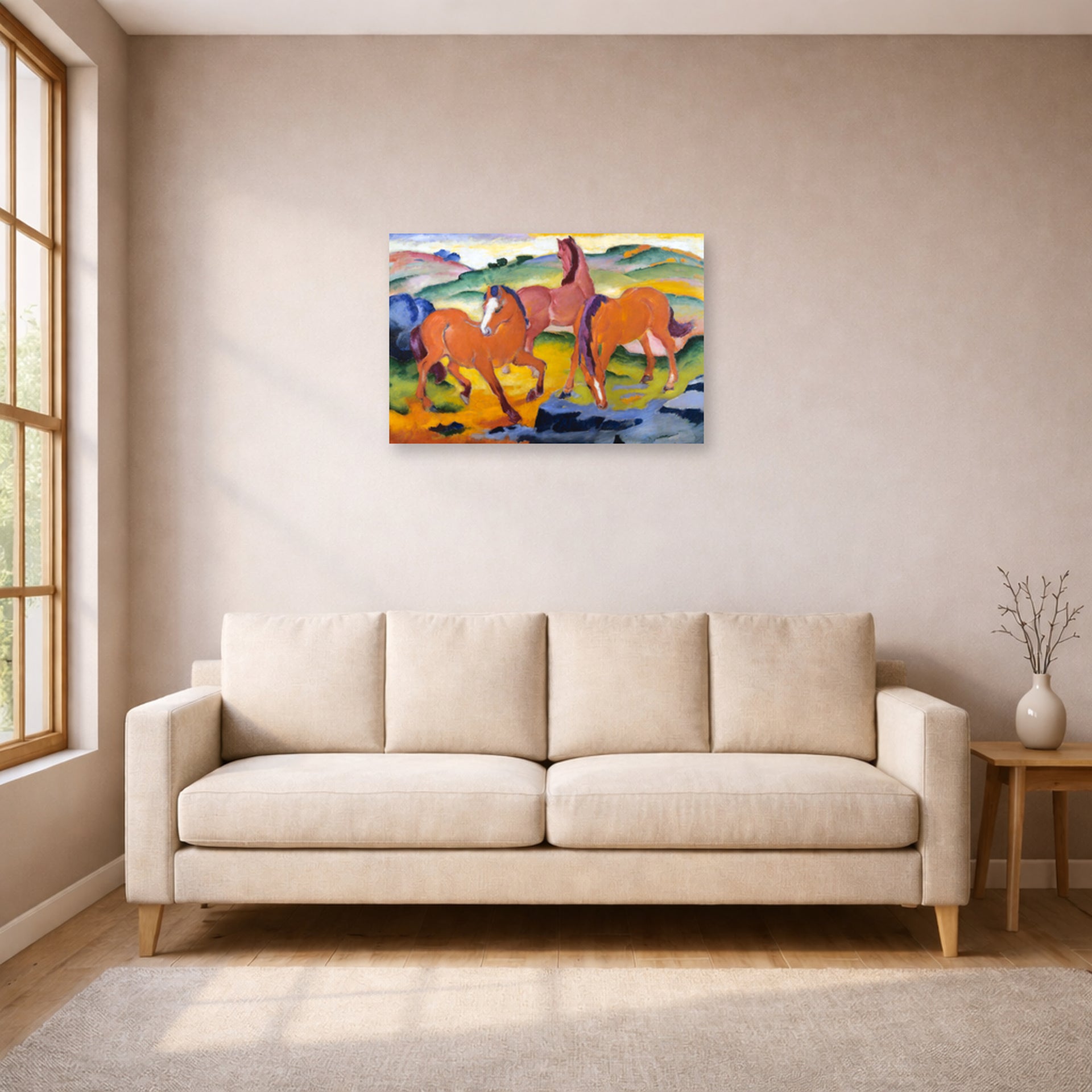 Unframed poster print of Franz Marc's Grazing Horses IV (The Red Horses) displayed on a wall in a living room