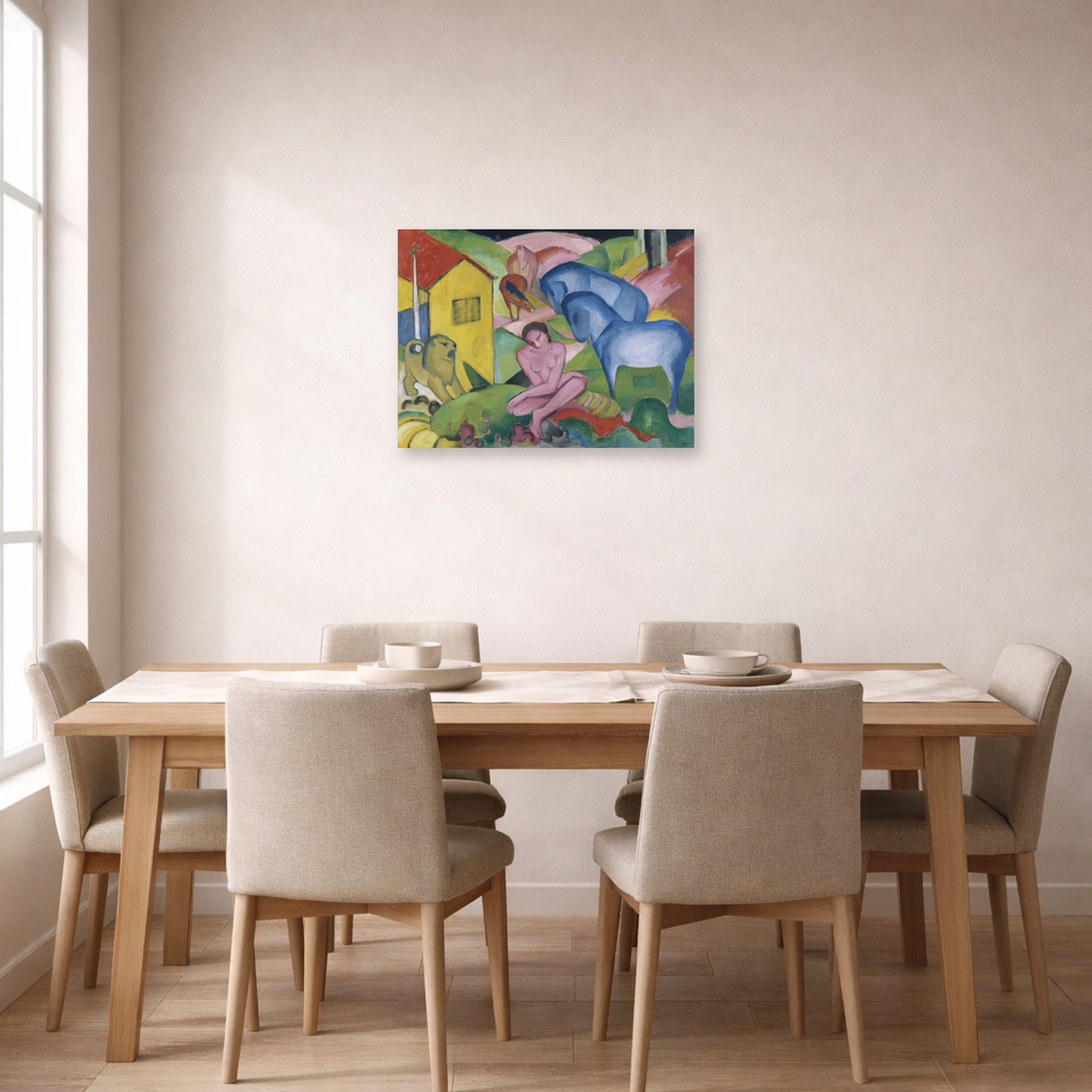Unframed poster print of Franz Marc's The Dream displayed on a wall in a dining room