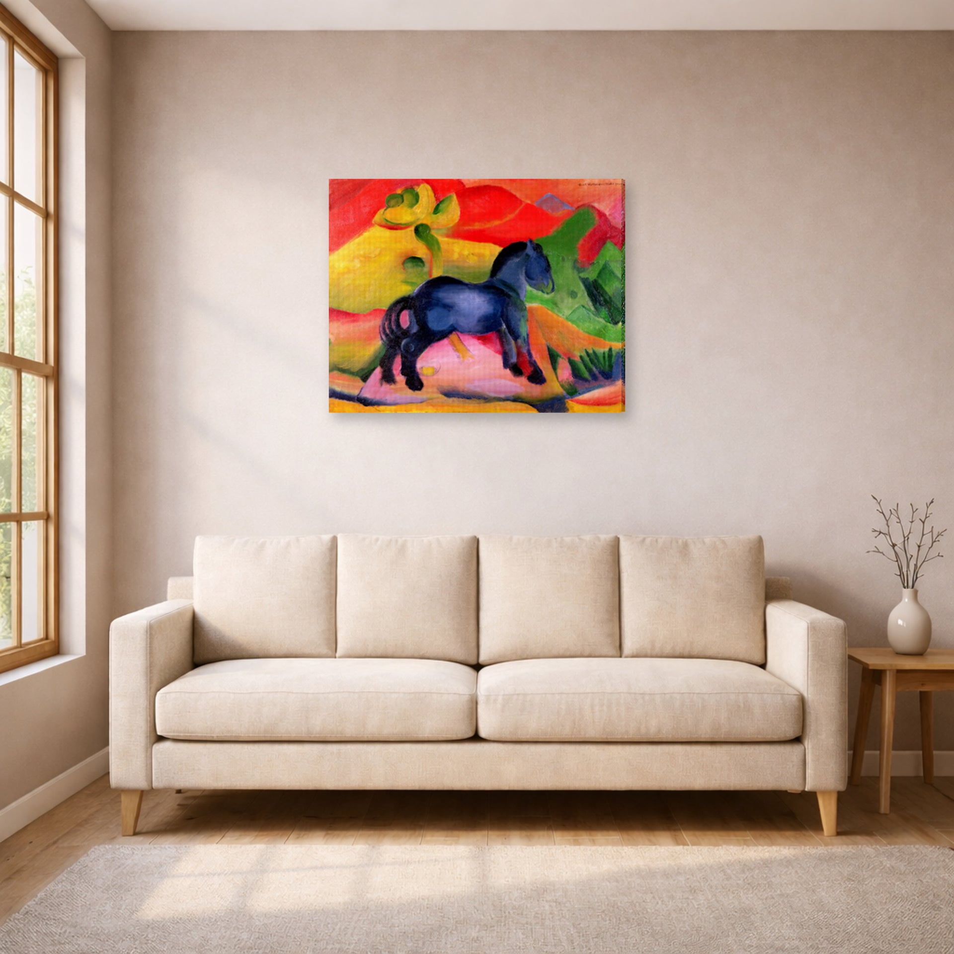 Gallery-wrapped canvas print of Franz Marc's The Little Blue Horse displayed on a wall in a living room