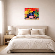Unframed poster print of Franz Marc's The Little Blue Horse displayed on a wall in a bedroom