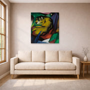 Gallery-wrapped canvas print of Franz Marc's The Tiger displayed on a wall in a living room