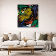 Gallery-wrapped canvas print of Franz Marc's The Tiger displayed on a wall in a living room