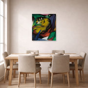 Unframed poster print of Franz Marc's The Tiger displayed on a wall in a dining room