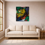 Unframed poster print of Franz Marc's The Tiger displayed on a wall in a living room
