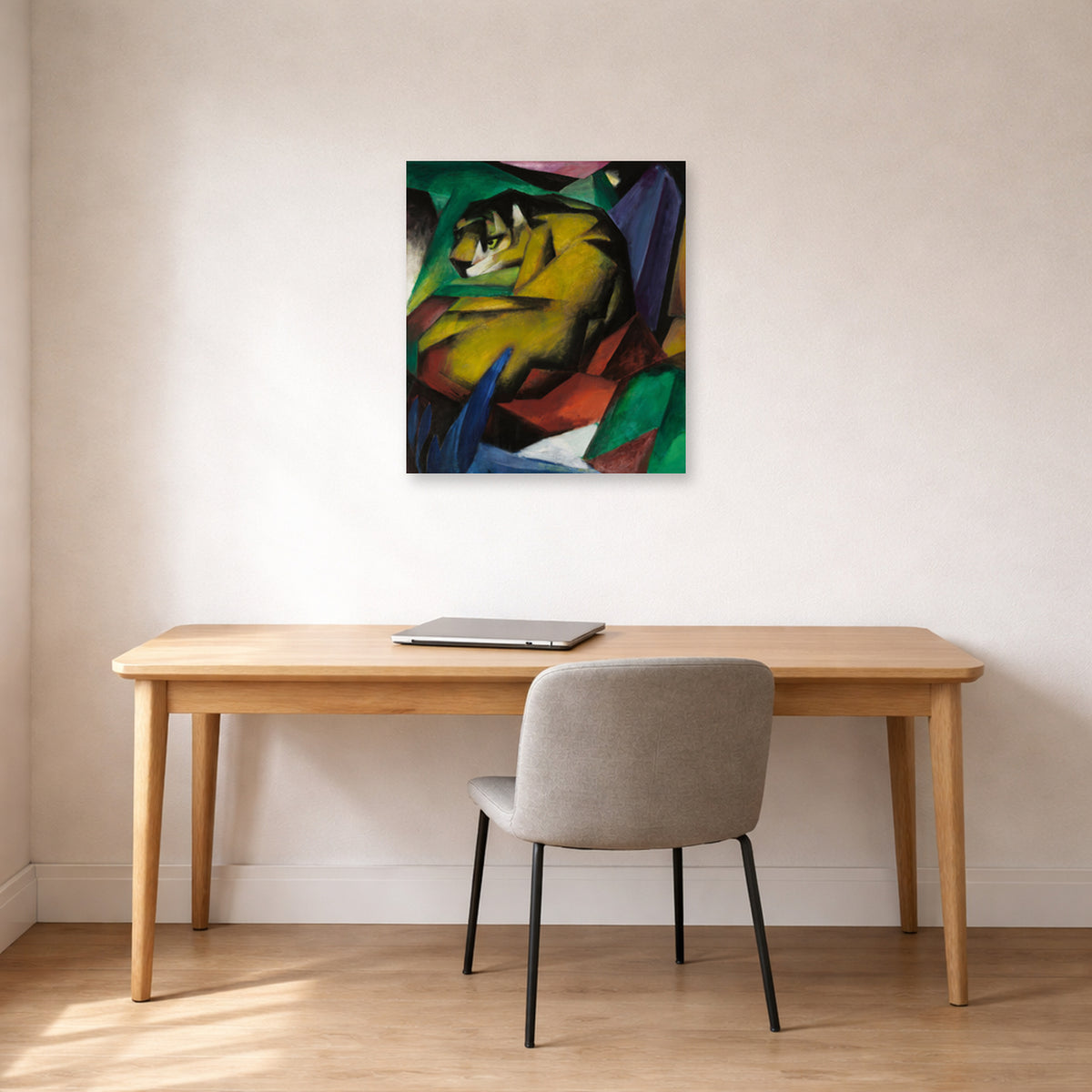 Unframed poster print of Franz Marc's The Tiger displayed on a wall in an office