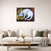 Unframed poster print of Franz Marc's The White Cat displayed on a wall in a living room
