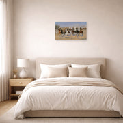 Unframed poster print of Frederic Remington's 'A Dash for the Timber' displayed on a wall in a bedroom