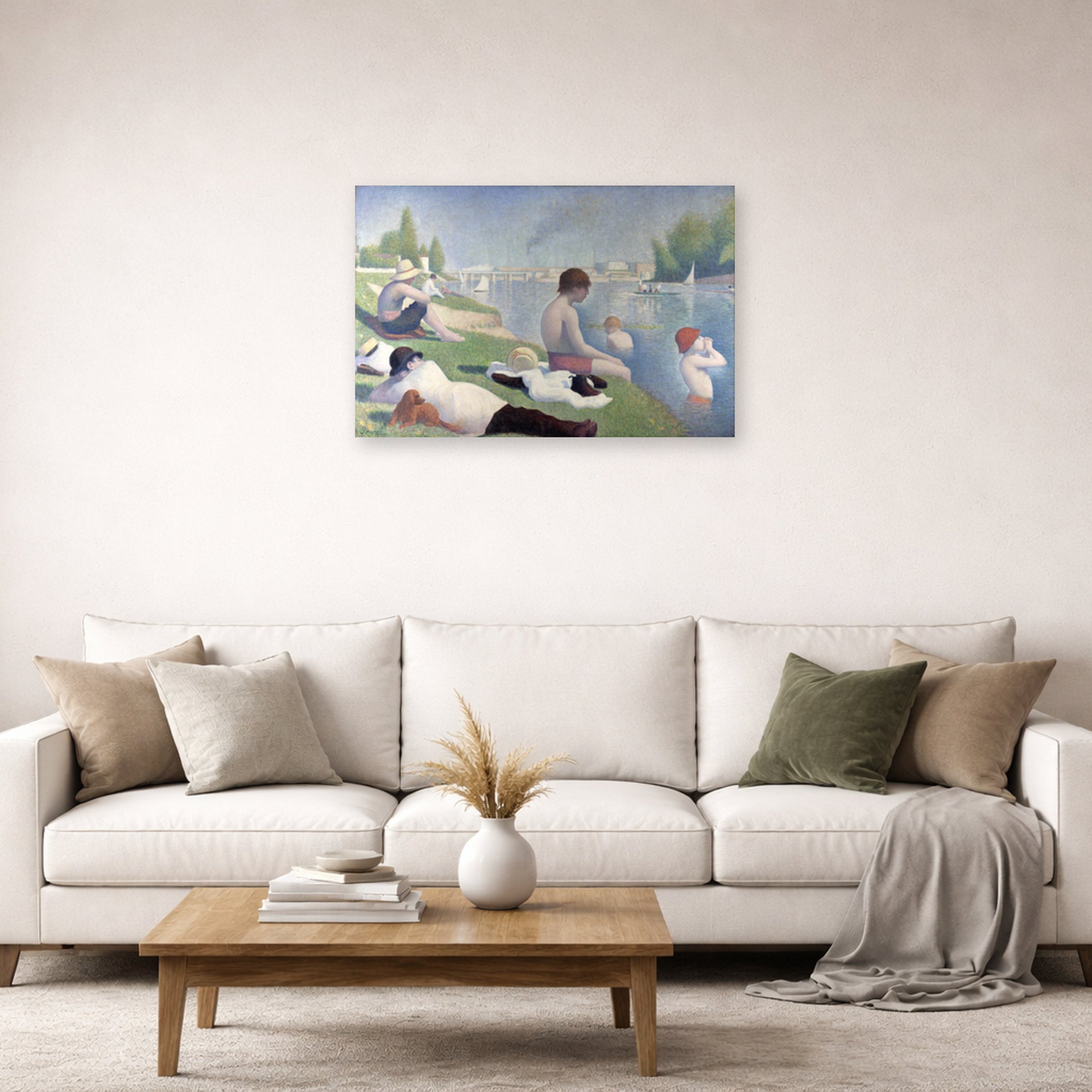 Unframed poster print of Georges Seurat's Bathers displayed on a wall in a living room