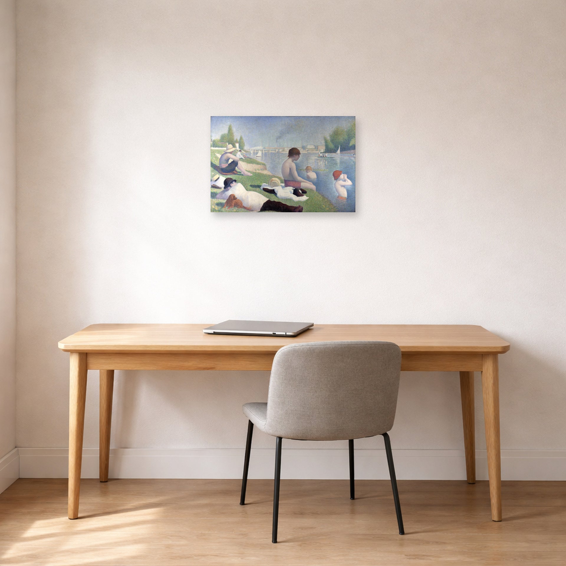 Unframed poster print of Georges Seurat's Bathers displayed on a wall in a office