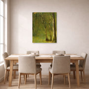 Unframed poster print of Georges Seurat's The Forest at Pontaubert displayed on a wall in a dining room