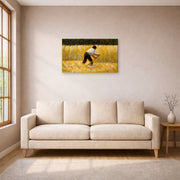 Gallery-wrapped canvas print of Georges Seurat's The Mower displayed on a wall in a living room