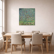 Gallery-wrapped canvas print of Gustav Klimt's 'Apple Tree' displayed on a wall in a dining room