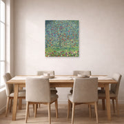 Unframed poster print of Gustav Klimt's 'Apple Tree' displayed on a wall in a dining room