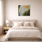 Gallery-wrapped canvas print of Gustav Klimt's 'Danae' displayed on a wall in a bedroom