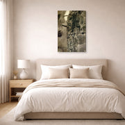 Gallery-wrapped canvas print of Gustav Klimt's 'Faculty Paintings' displayed on a wall in a bedroom