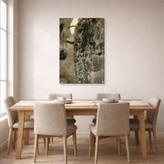 Gallery-wrapped canvas print of Gustav Klimt's 'Faculty Paintings' displayed on a wall in a dining room